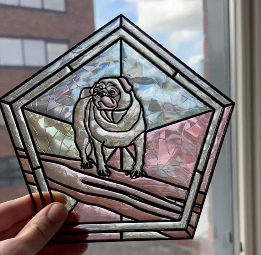 A stained glass style artwork created using a 3D printed frame and colored resin.